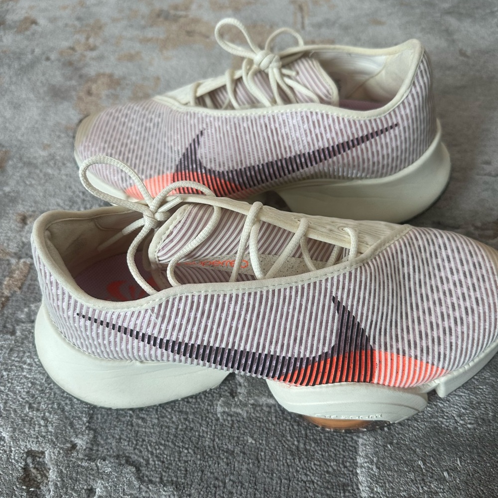 Nike White and Orange Athletic Shoes with Cushioned Midsole